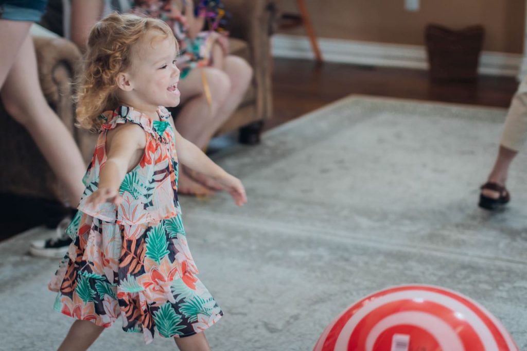 Amelia running in her Janie and Jack Tiered Dress